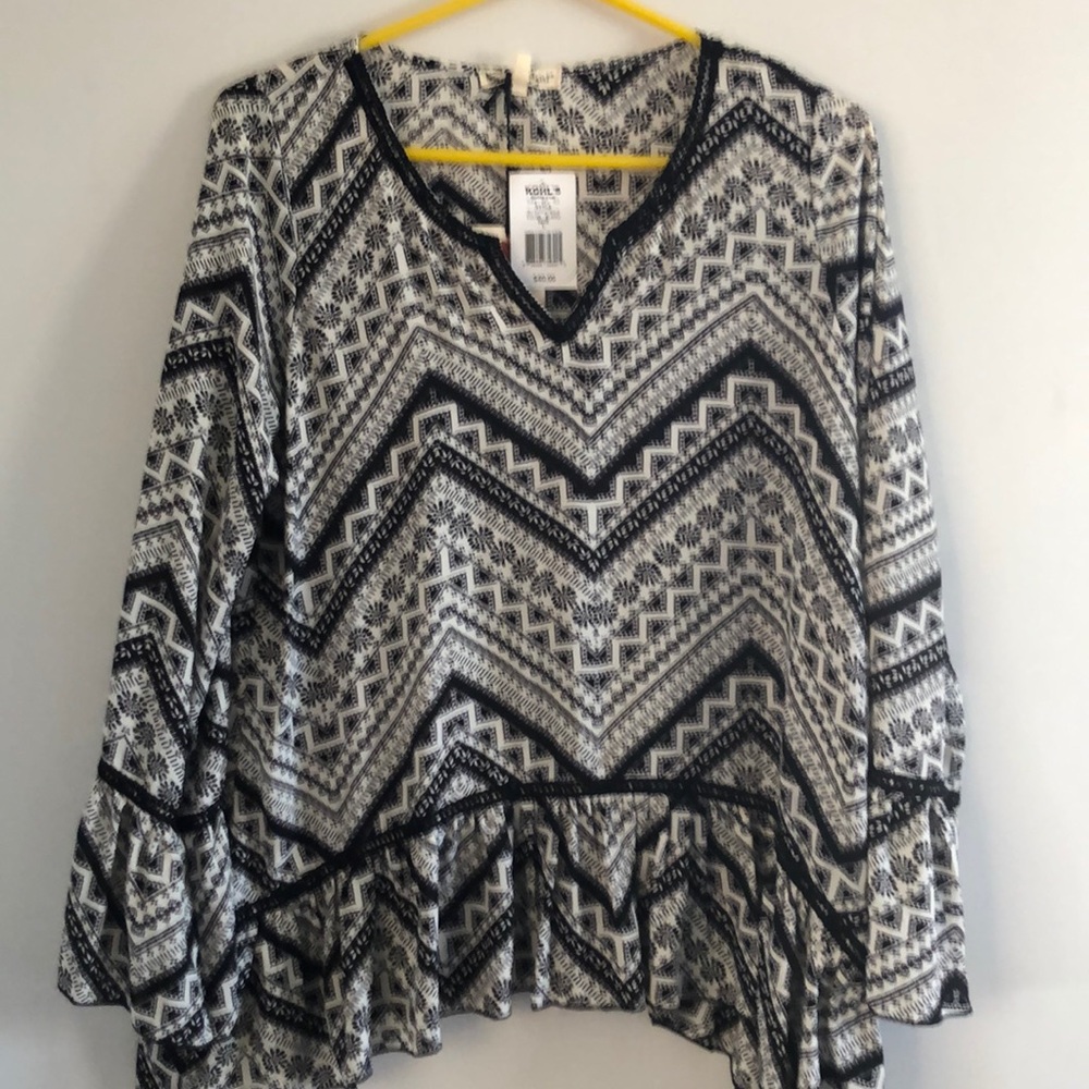 About a girl .. woman’s top size L. NWT
